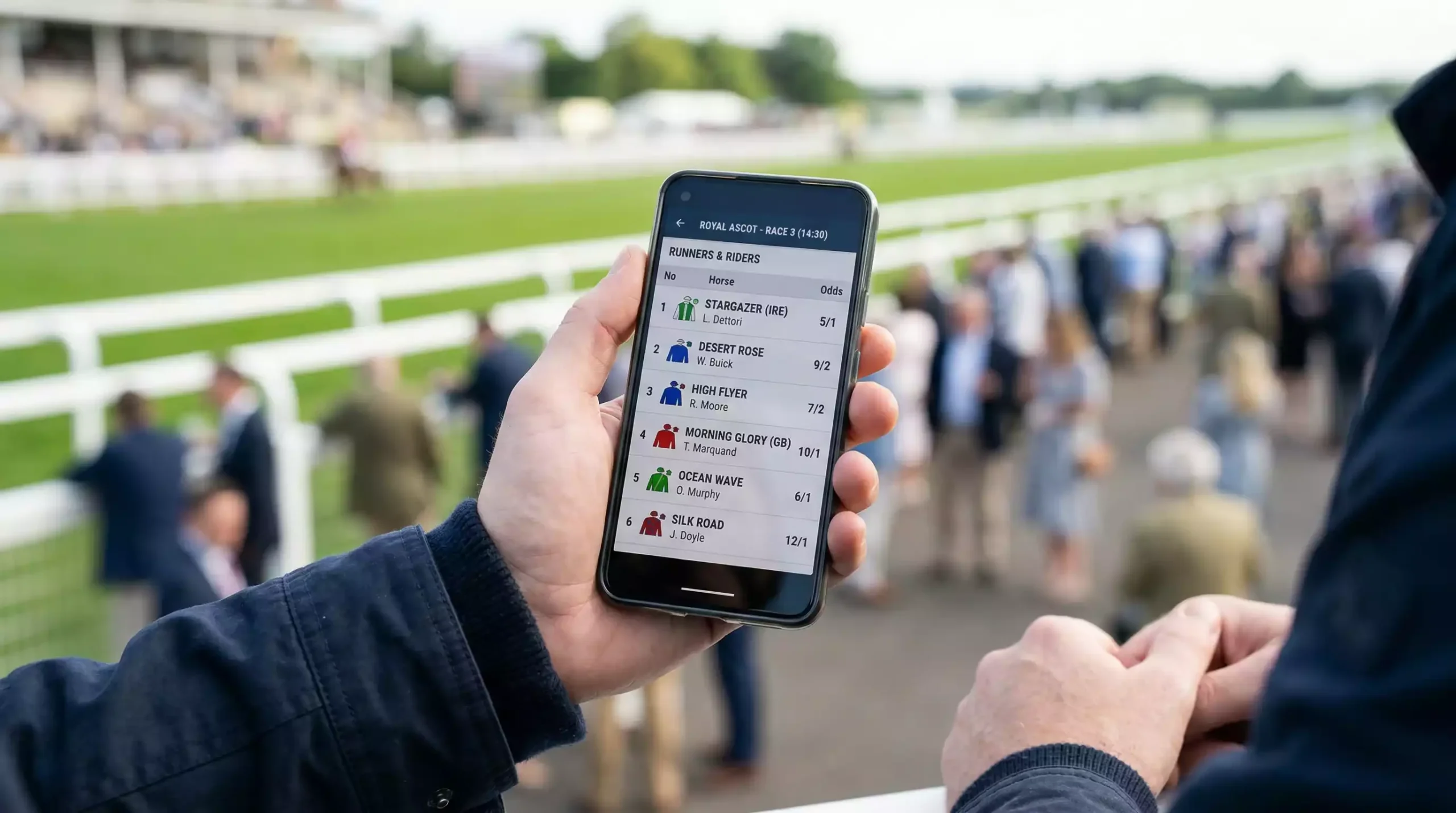 Punter checking non-runner updates on a mobile phone before racing